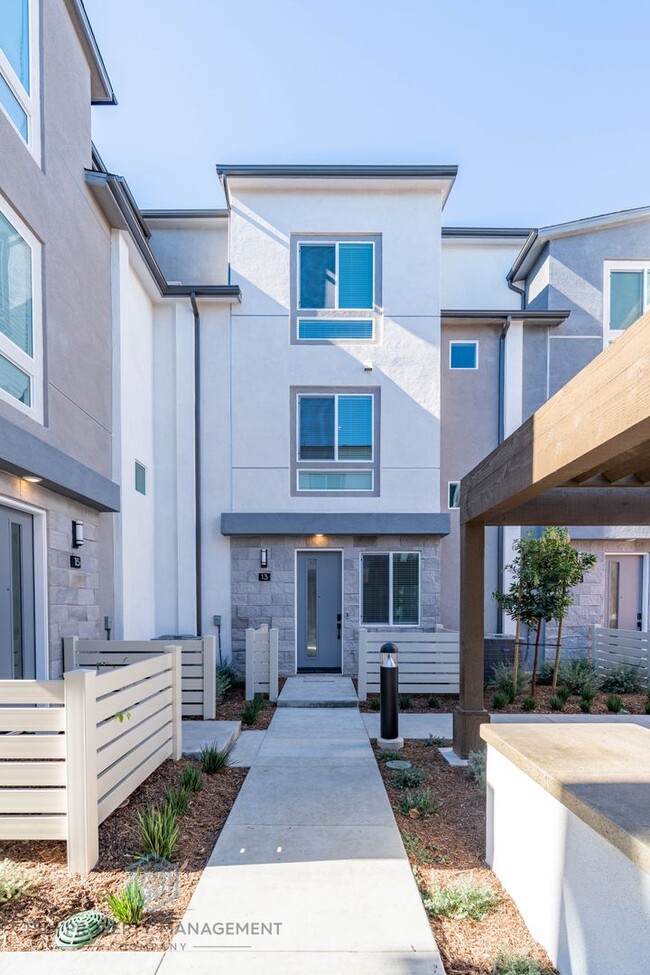 Building Photo - NEW BUILT 2 Bedroom Townhome in the Heart of Garden Grove! Unit 13