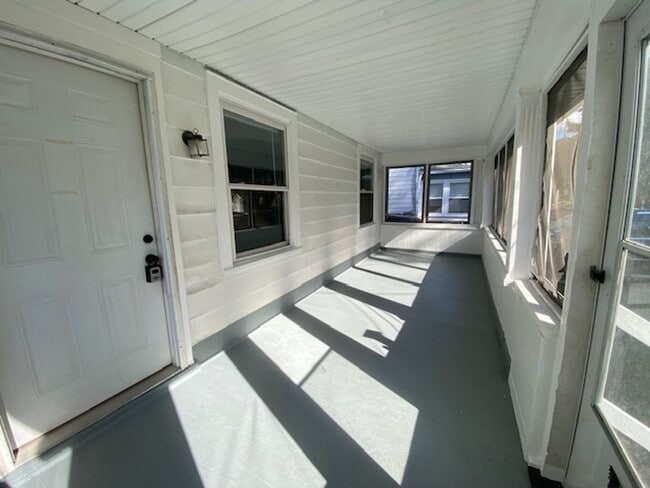 Photo - Updated 4-Bed with Porch & 2-Car Garage on...