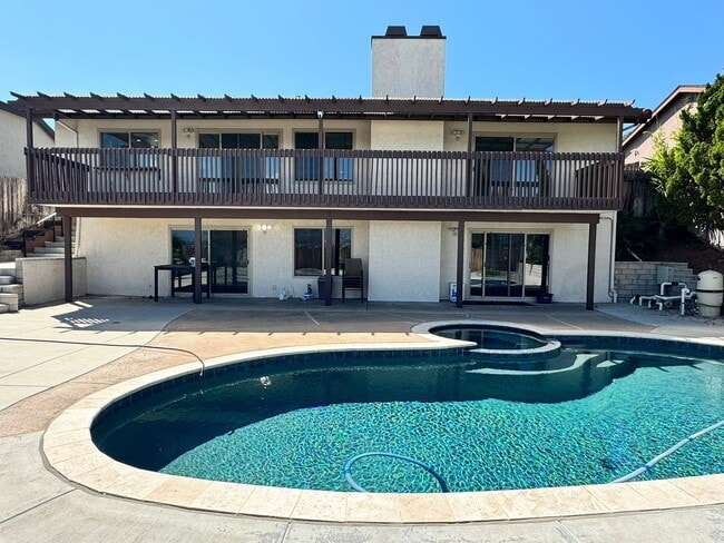 Building Photo - Remodeled 4 Bed / 3 Bath Home with Pool, S...