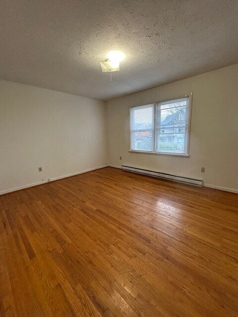 Photo - 1/2 Off First Month's Rent with move-in by December 19th, 2025

"Charming 2-Bed Oasis in Front Ro...