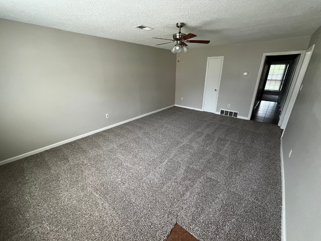 Photo - 3BR/2BA Memphis Rental with Bright Open Living Room & Fenced Yard