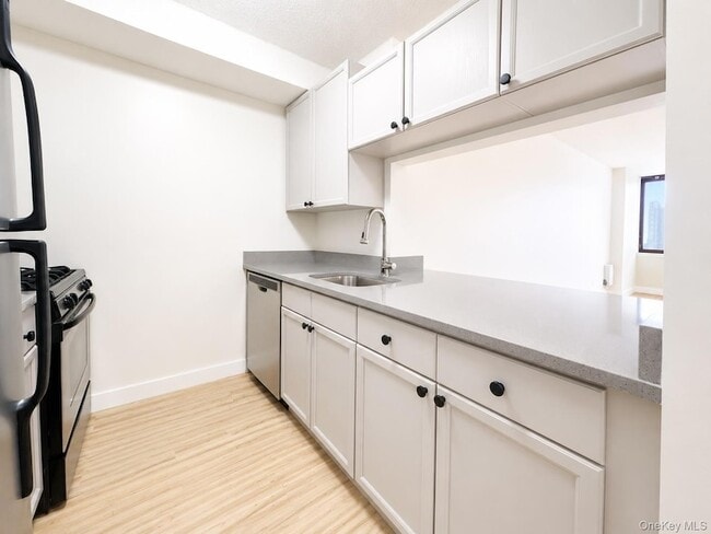 Photo - 4-74 48th Avenue Unit 30-J Unit 30-J