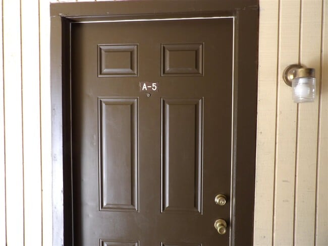 Building Photo - 6405 NW Oak Ave Unit A-5