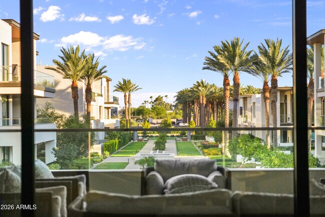 Building Photo - 6587 N Palmeraie Blvd Unit 2014