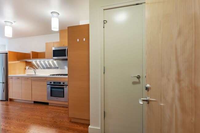 Photo - John Ross - 8th floor south waterfront studio w/parking/most utilities/concierge Unit JR816