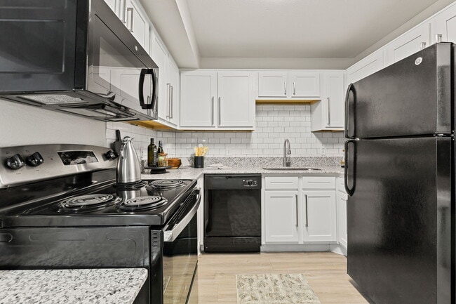 4BD, 4BA - 1443SF - Kitchen - Villages at East Riverside