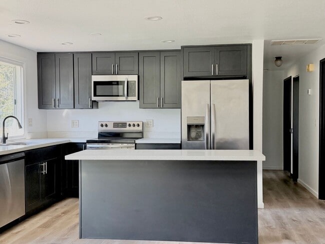 Photo - Charming 4BR Home with Huge Yard - W/D and Garage