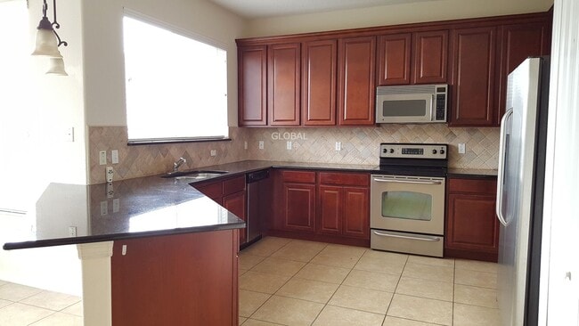 Photo - Elegant 4-Bedroom Home in Gated Eagle Creek with Resort-Style Amenities - Pet Policy: No Pets All...