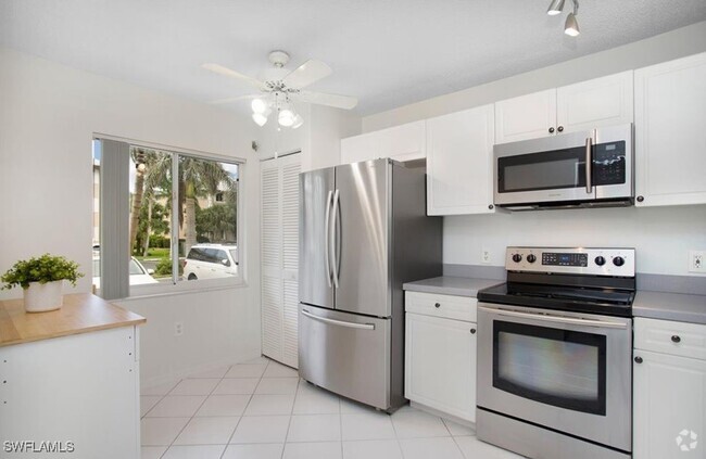 Building Photo - 3012 Sandpiper Bay Cir Unit D102 Rental