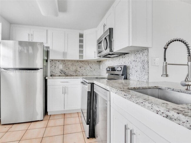 Building Photo - 14155 SW 87th St Unit E-307 Rental