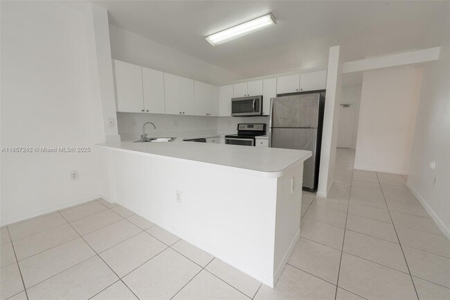 Building Photo - 6930 NW 179th St Unit 407-8 Rental