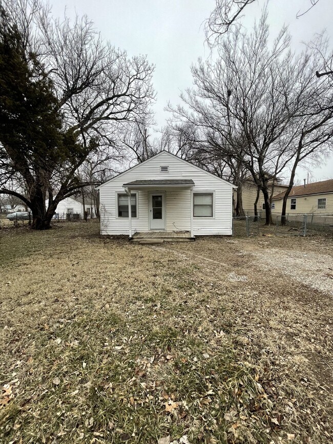 "Charming 3-Bed Home with Gleaming Hardwood Floors in Prime Wichita Location!"