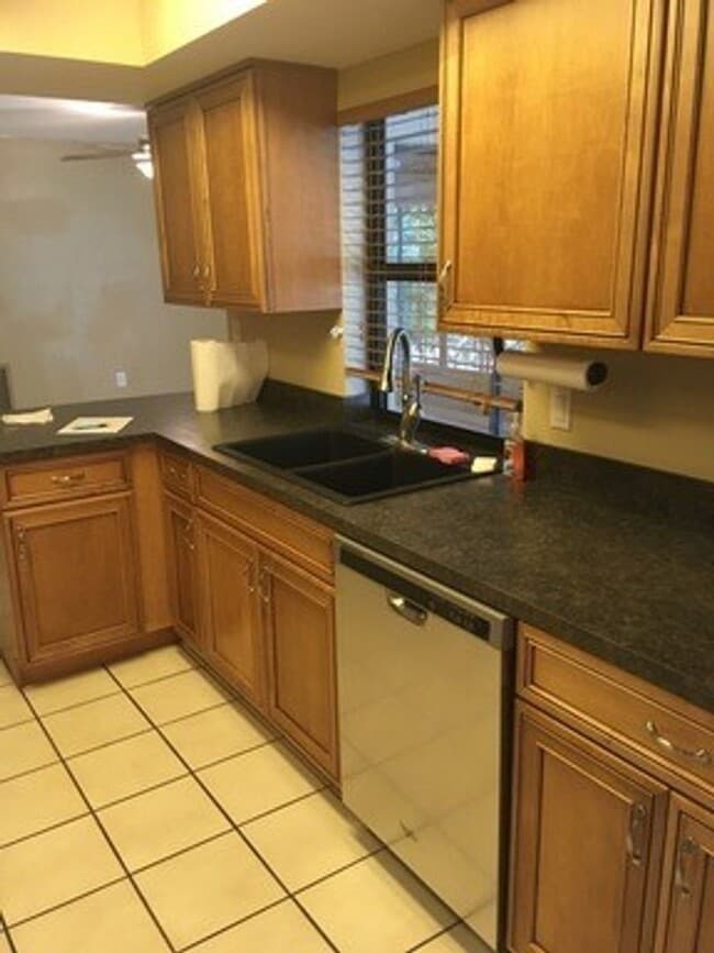 Photo - Location, convenience, comfort. This 4 bedroom plus den, 2 bath has it all!