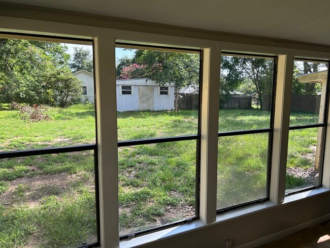 Large backyard with storage shed