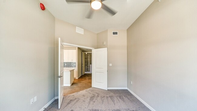 Imperial Crossing Luxury Apartment Homes unit showing a bedroom off the kitchen area.
