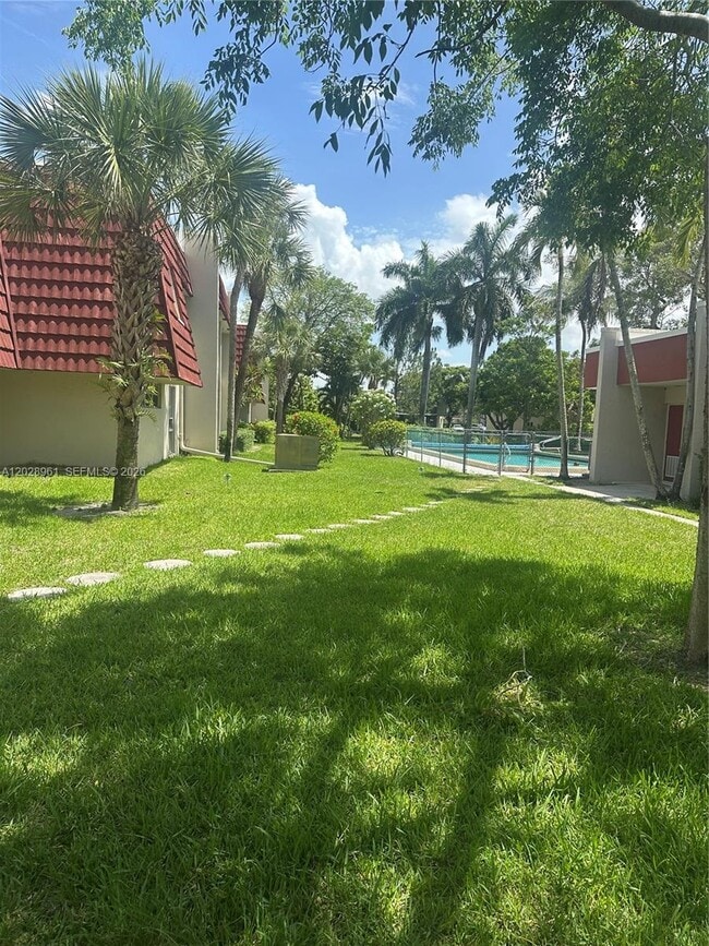 Building Photo - 5 Jacaranda Country Club Dr Unit 206