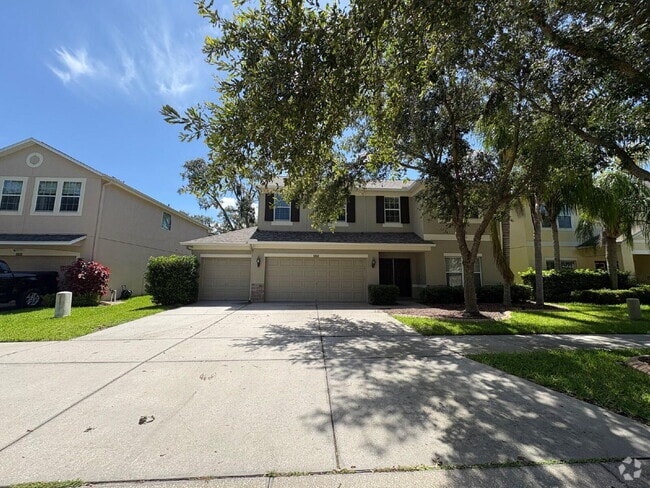Building Photo - Spacious 5-Bedroom Pool Home with Putting ...