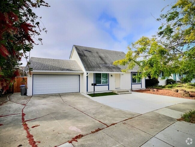Building Photo - 4 BD/2 BA Home with Spacious Backyard and ...