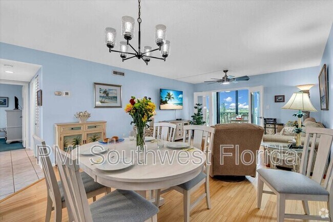 Building Photo - 9393 Midnight Pass Rd Unit #402 Rental