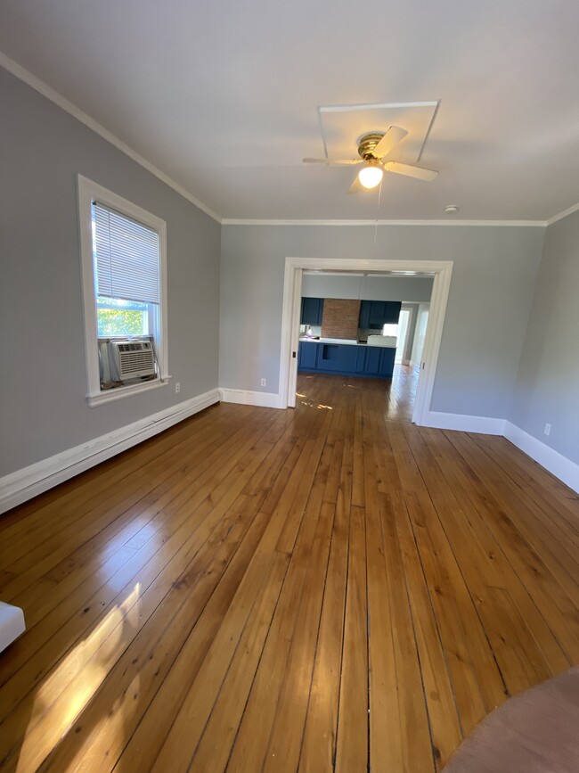 Living room/first parlor - 86 Holden St Apartments Unit 2