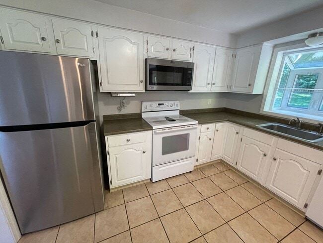 Photo - Beautiful 4 Bedroom House *w/ an In-Law* in Cheshire! Garage Parking, Central Air, & a Beautiful ...