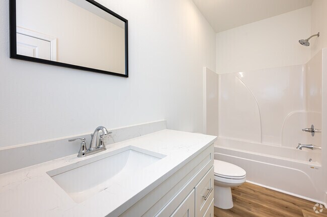 2BR, 2BA - 900SF - Primary Bathroom - Palmetto Place Apartments