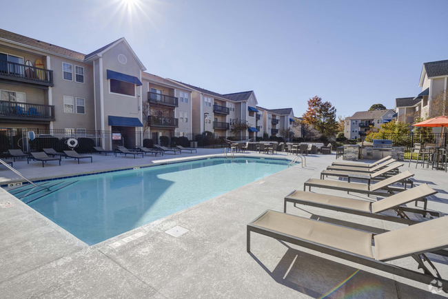 Building Photo - Quad Apartment Homes