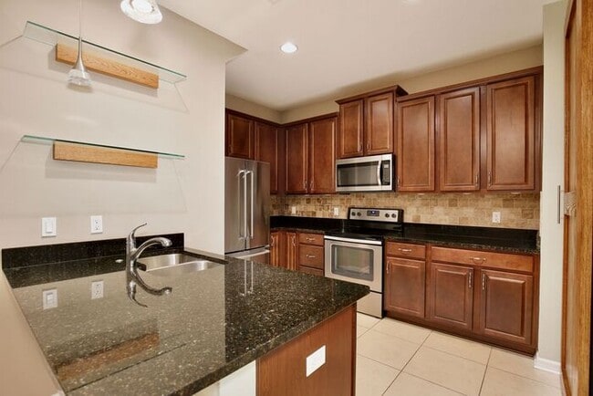 Photo - Gorgeous 4/2.5 Spacious Townhome with a Loft Area and a 2 Car Garage in the Desirable Gated Commu...