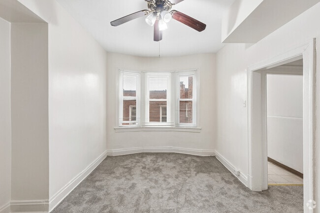 2BR, 1BA - 900SF - Living Room - 641 Collins St