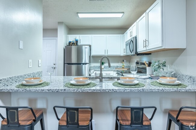 Kitchen with granite counters and stainless appliances