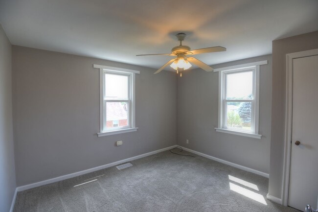 Photo - 2-Bedroom, 1-Bath Single-Family Home with Integral Garage and Renovated Interior for Rent