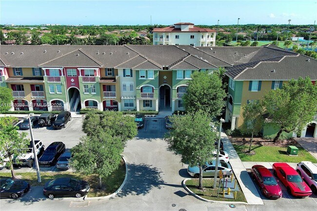 Building Photo - 11102 NW 83rd St Unit 222