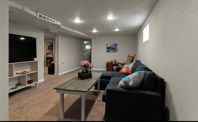 Front room - 105 W Brookside St House