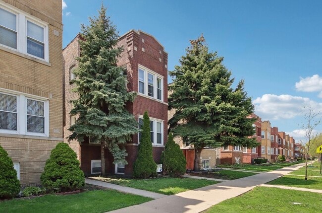 Building Photo - 5309 W Henderson St Unit 1