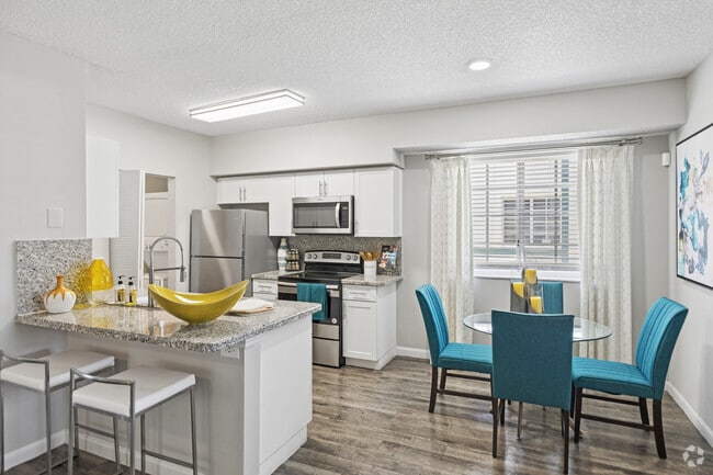 2BR, 2BA - 1165SF - Kitchen And Dining Room