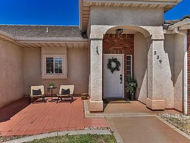 Photo - "Charming 4-Bed Oasis with Elegant Hardwoo...
