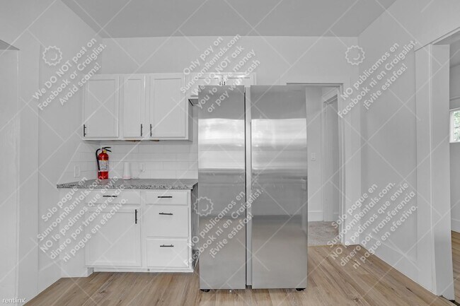 Photo - 5 br, 2 bath House - 119 N Utica Ave