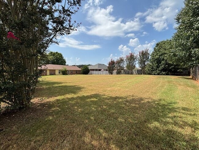 Photo - You will LOVE the fenced yard!