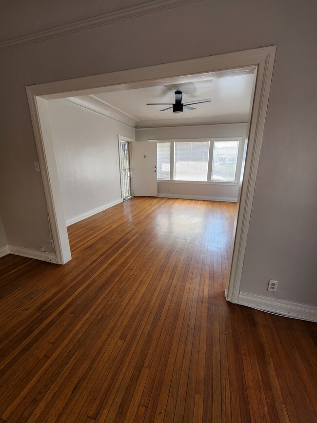 Living room and front door - 335 49th E St Apartment Unit 335 E 49th st