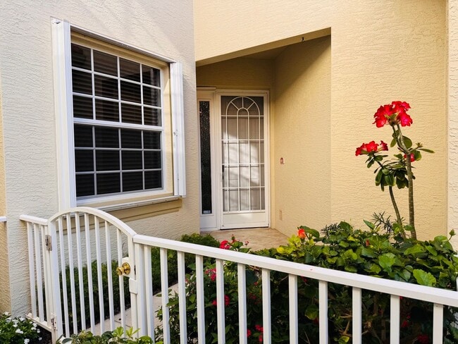 Photo - Experience Bell Tower Park. GATED ground floor 2 Bed 2 Bath Den 1 Car Garage Condo.