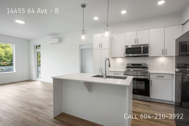 Building Photo - Brand New Condo in Sterling at Bell Centre - Last Month Free! Unit B