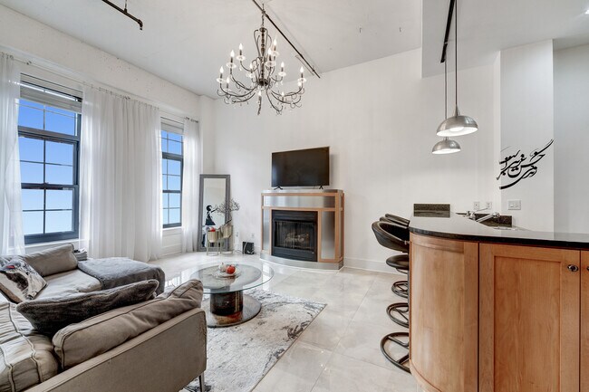 Grand Living Room with 12' ceilings & gas fireplace! - 2328 Champlain St NW Unit 413