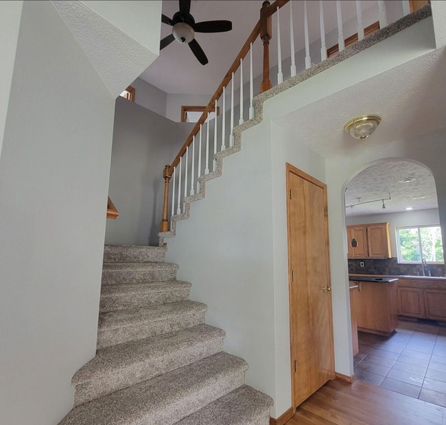 Upstairs leading to bedrooms - 4311 E 41st Ave
