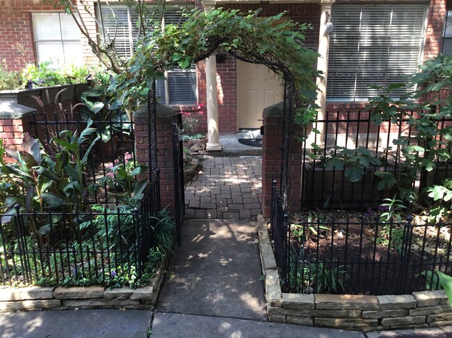 Gated courtyard access to the front door - 1103 Dulles Ave Condo Unit 603