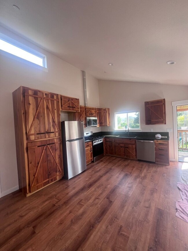 Photo - 2 Bedroom 1 bath house with extra large double car garage and extra storage space!