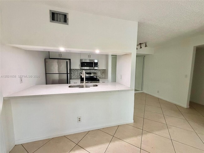 Building Photo - 7137 Golf Colony Ct Unit 202