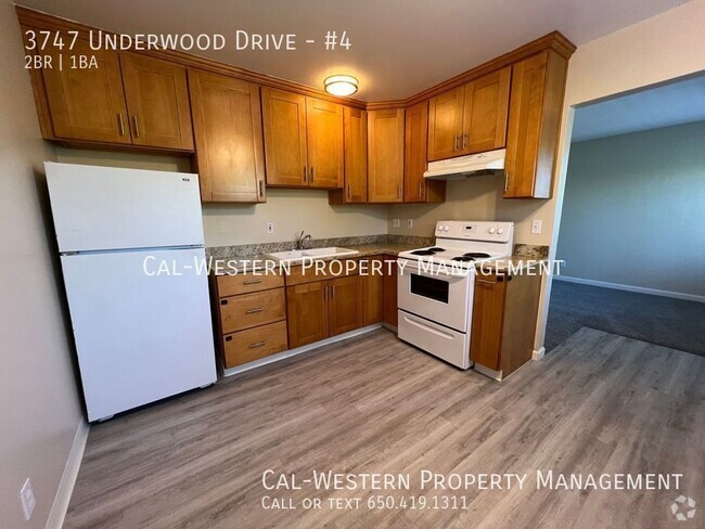 Building Photo - Remodeled Kitchen- Bright Upstairs 2/1 at ... Unit #4 Rental