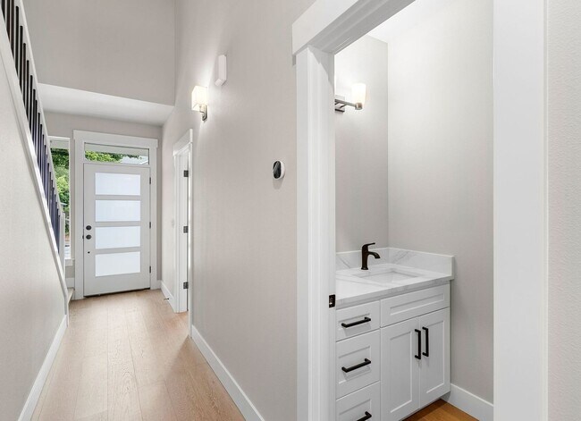Photo - Brand-New 4-Bedroom Home Offering Modern Design, High-End Finishes, Attached Garage & Private Bac... Unit #A