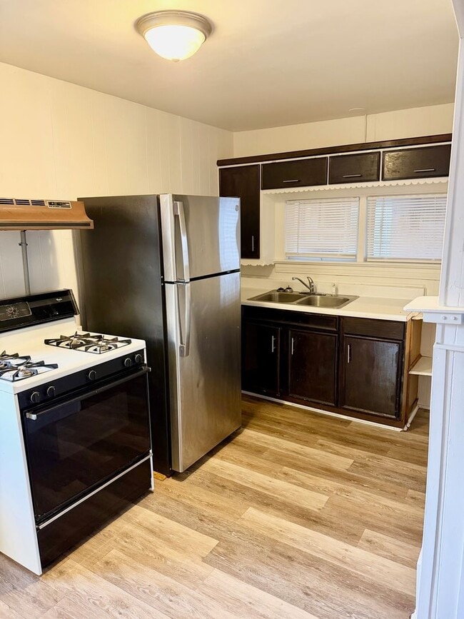 Photo - Cozy 2–3 Bedroom, 1 Bath Home with Garage & Sunroom