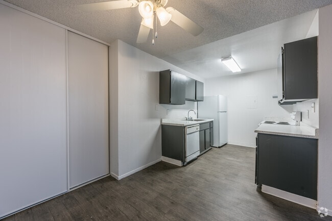 3BR, 2BR - 1100SF - Kitchen and Dining Area